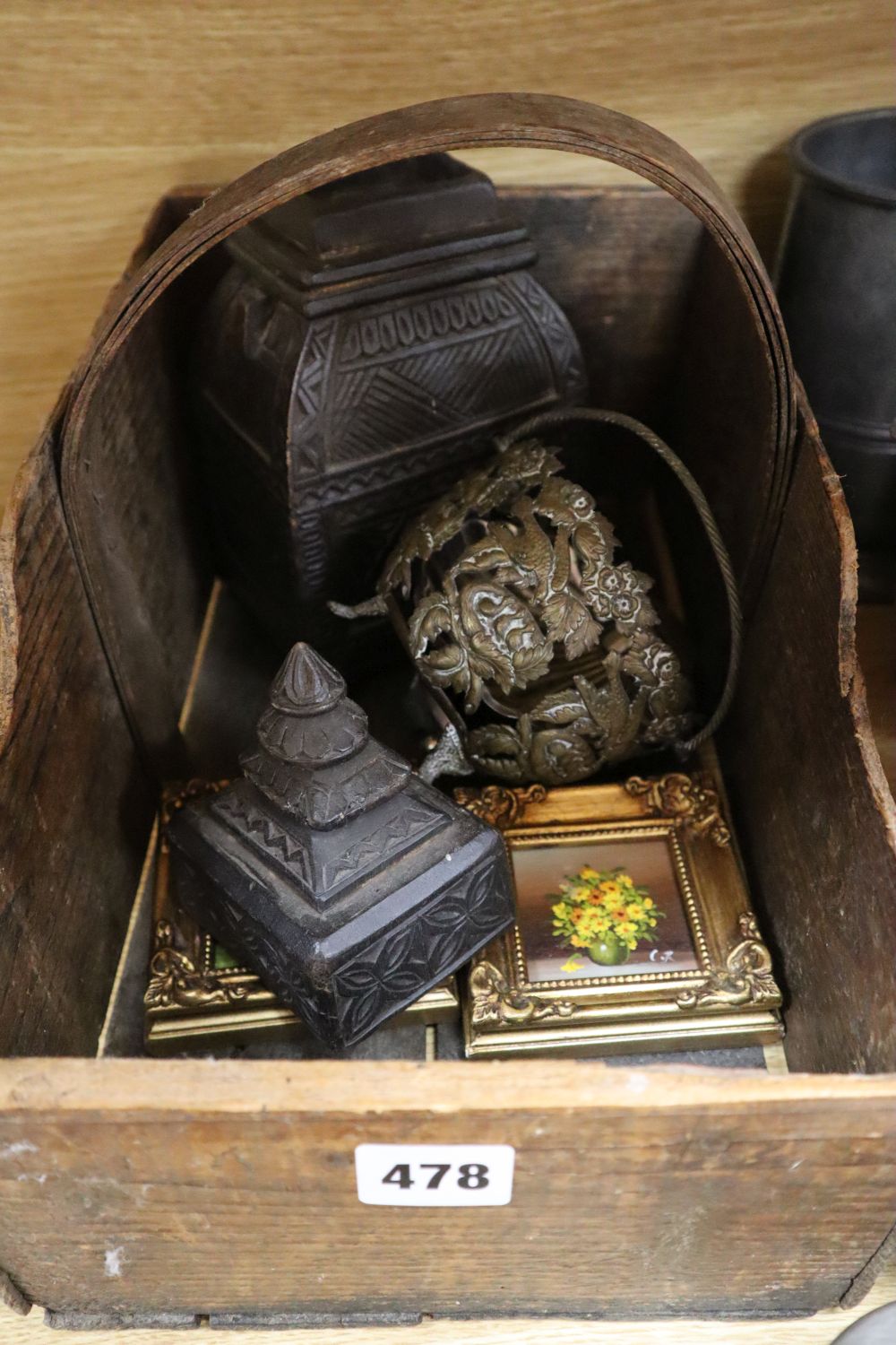 Assorted decorative objects including metalware, books, etc.